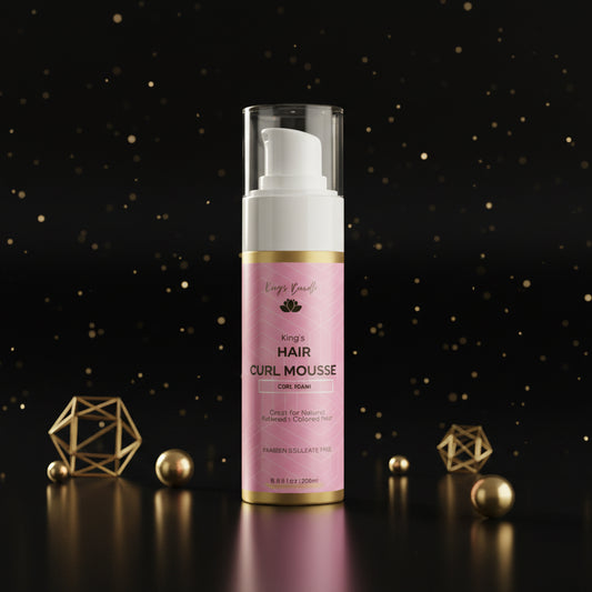 Pink bottle of King's Hair Curl Mousse on a white background