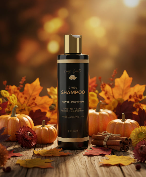 Black shampoo bottle with gold accents on a white background