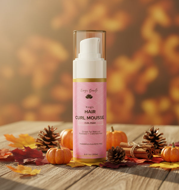 Pink bottle of King's Hair Curl Mousse on a white background