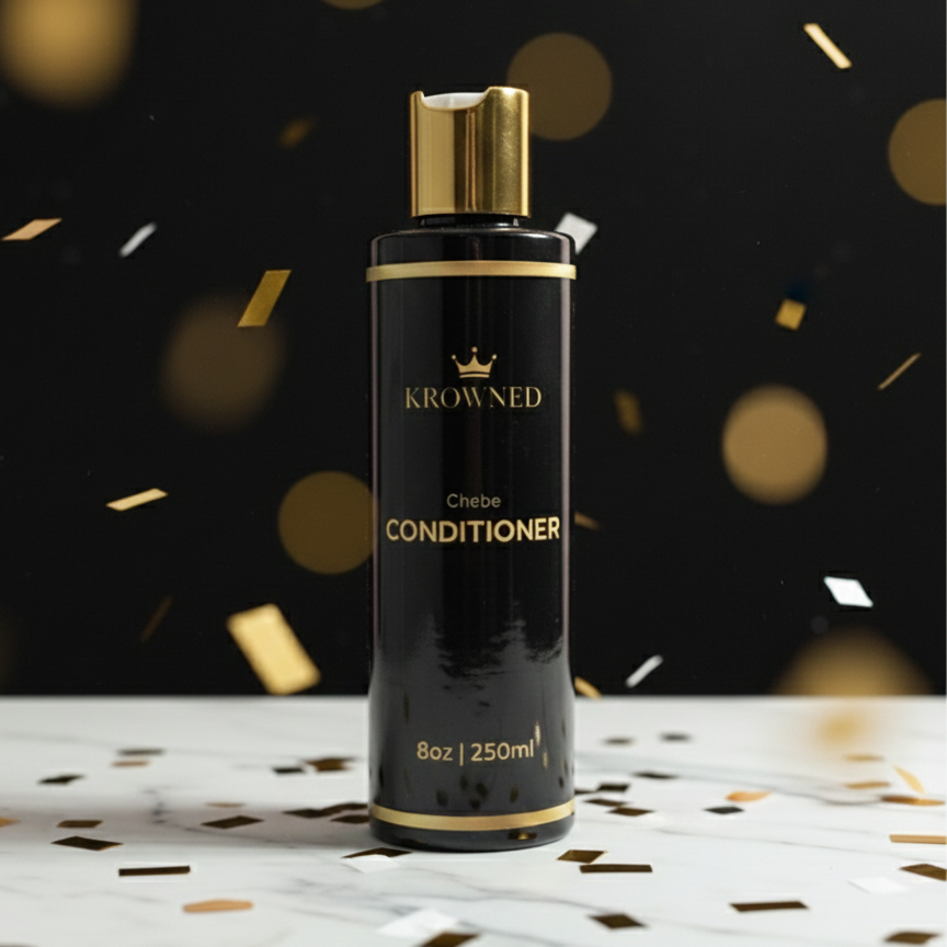Krowned conditioner bottle with gold accents on a black background with confetti