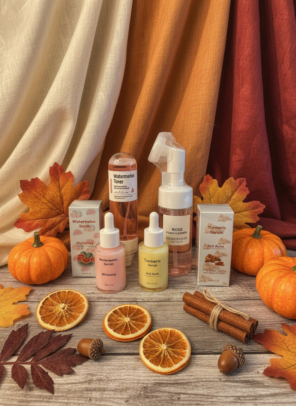 Collection of skincare products including bottles and boxes on a light surface.